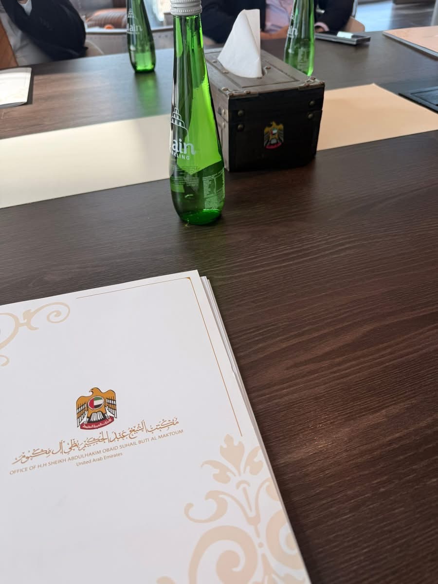 A second view of the meeting table and presentation folder.